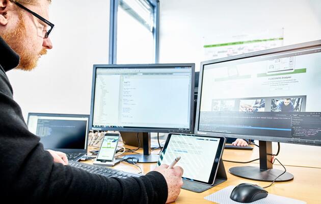 Software-Entwicklung mit der Plattform SharePoint.